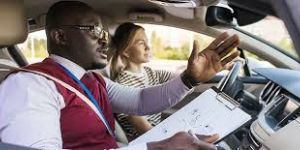 Driver instructor and student in a car