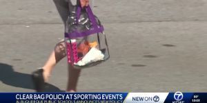 image of a person carrying a clear bag.