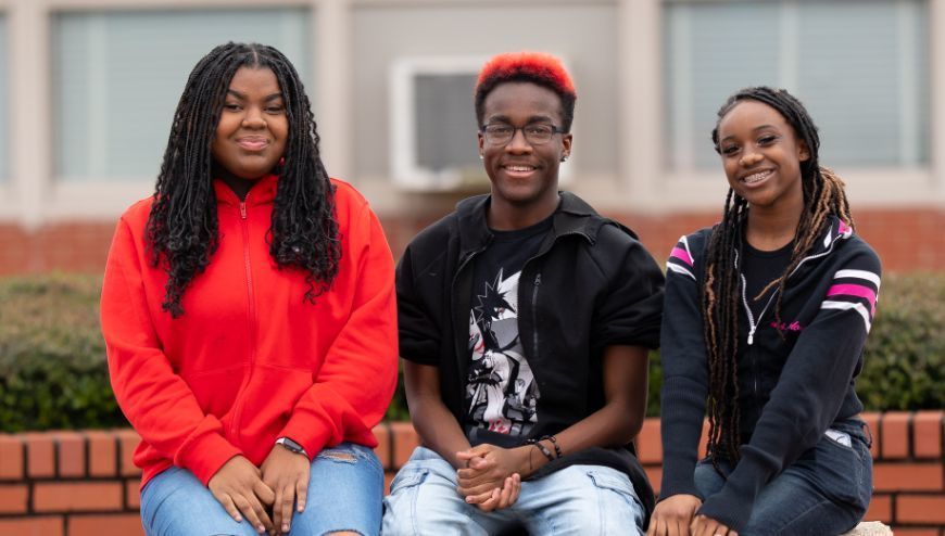 Students sitting on a Bench