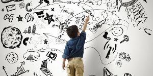 image of student drawing on board