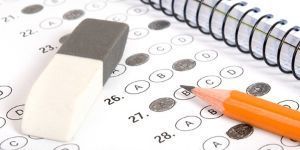 testing bubble sheet with an eraser and a pencil lying on it