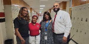 Photo imsge of students , NC state Rep and school principal