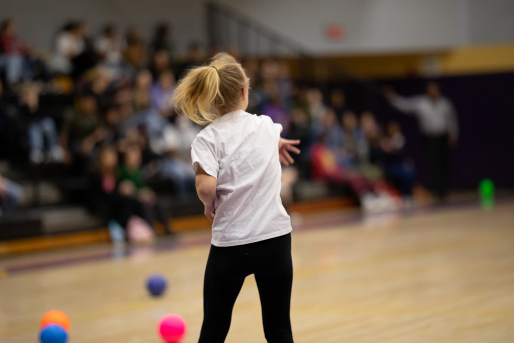 student throwing ball