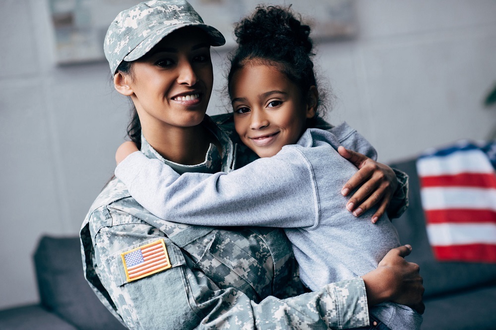 Soldier Holding Daughter