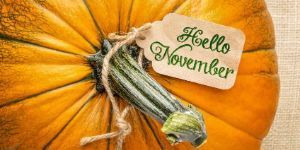 hello November on tag tied to pumpkin