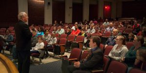 photo image of parents in an auditorium