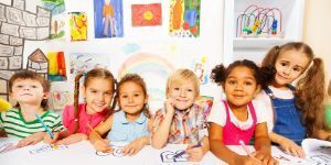 Image of group of children coloring and drawing