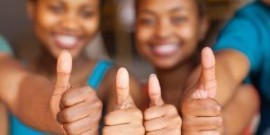 Students giving a thumbs up