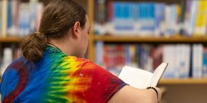 Girl Reading in the library