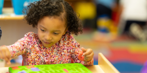 Child with Puzzle