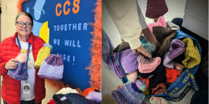 Cumberland Academy School Social Worker displaying handmade winter gear donated by community members for K-5 students.