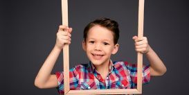 Kindergarten holding a picture frame