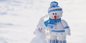 Snowman dressed up in snow