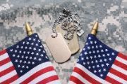 Image of two American flags and military dog chains