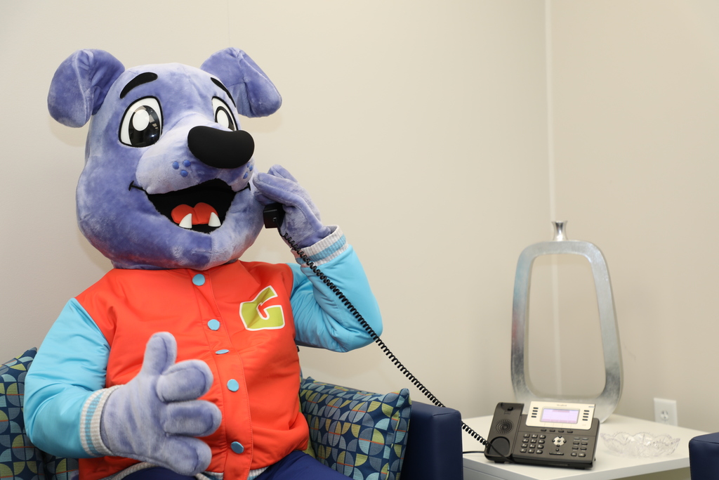 District Mascot on phone