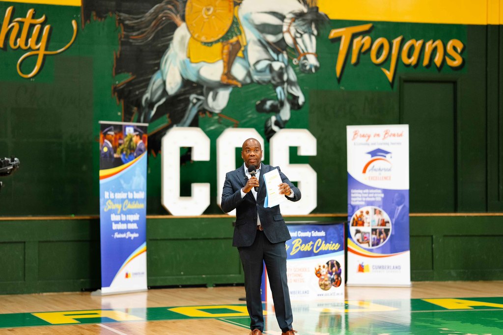 Dr. Bracy with microphone