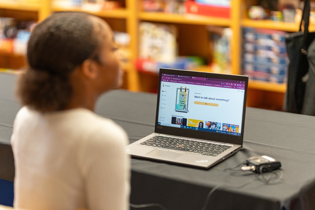 female student in front of laptop
