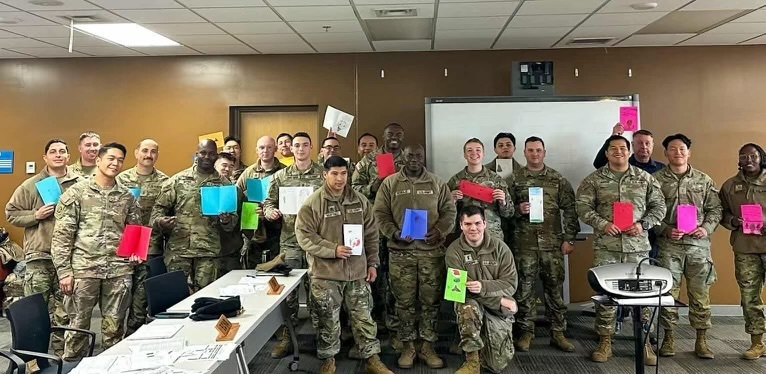 troops holding cards