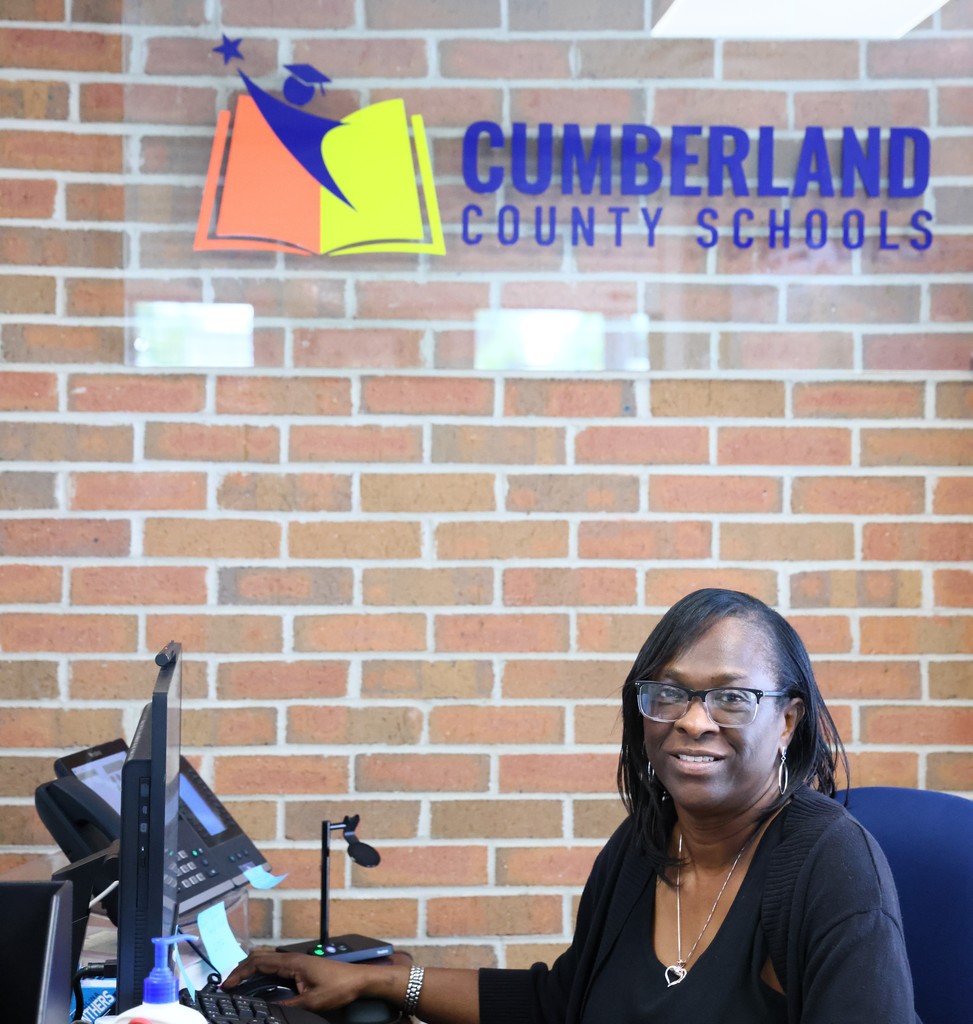 Receptionist at desk