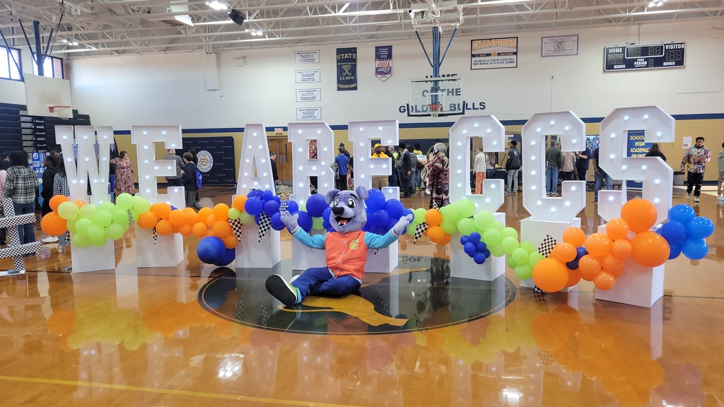 Cooper on floor with CCS balloons
