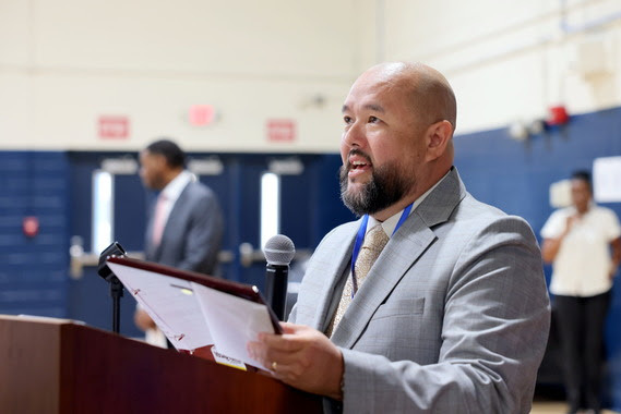 Ruben Reyes speaks after receiving the 2025-2026 Dr. Joseph Locklear/Ricky Lopes Central Services Employee of the Year award.
