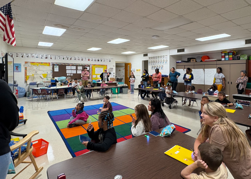 classroom with students and families