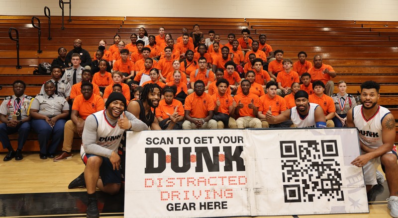 SVHS JROTC Program poses with acrobatic dunkers from A.G.A. Nation