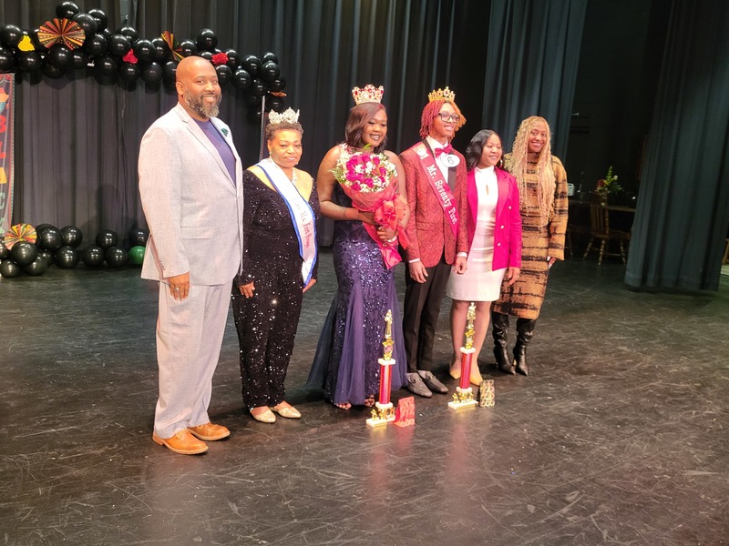 The pageant judges with  the Mr. and Miss winners