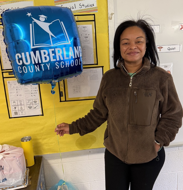 Woman holding ballon