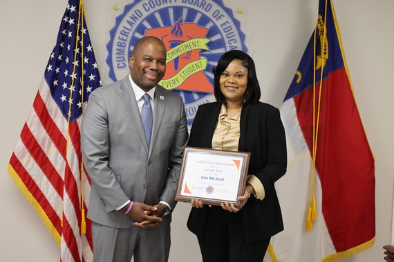 CCS Superintendent Dr. Eric Bracy and Extra Mile Award Recipient Lacinda Scott
