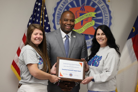 Committed Community Support Award Recipient Beaver Dam Elementary School PTA members and CCS Superintendent Dr. Eric Bracy