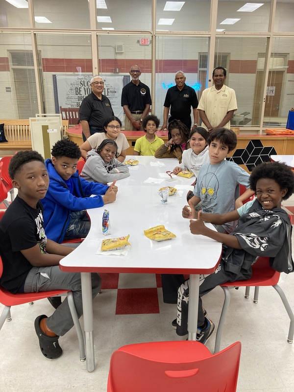 kids sitting at a table