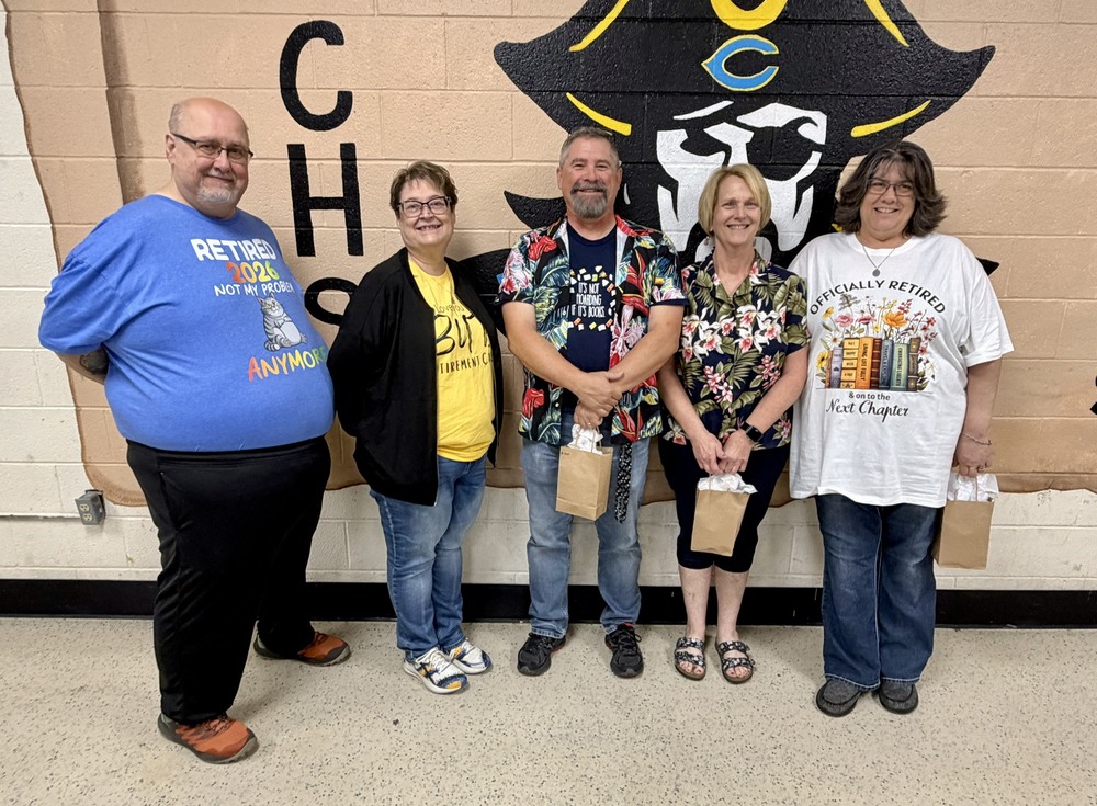 Pictured are five of the eight retirees.