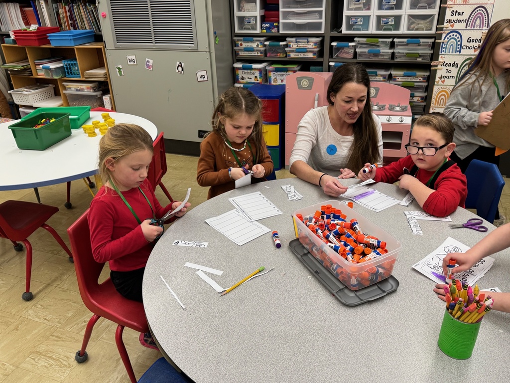 Students creating a 100 day booklet.