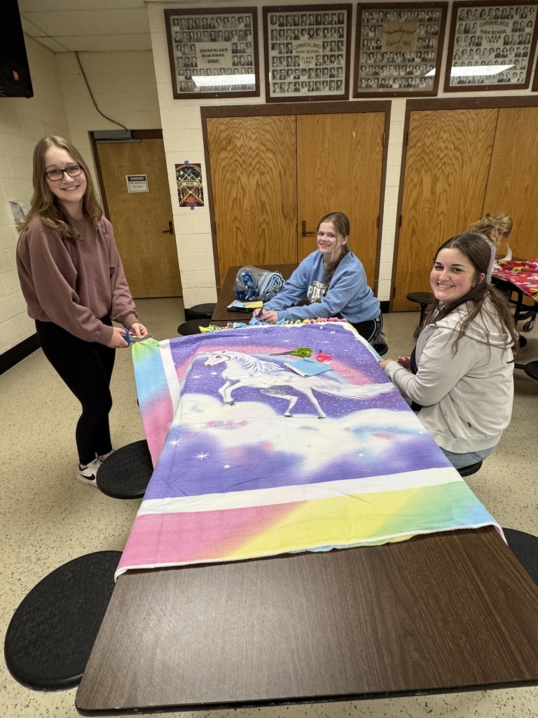 NHS students are tying the blankets.