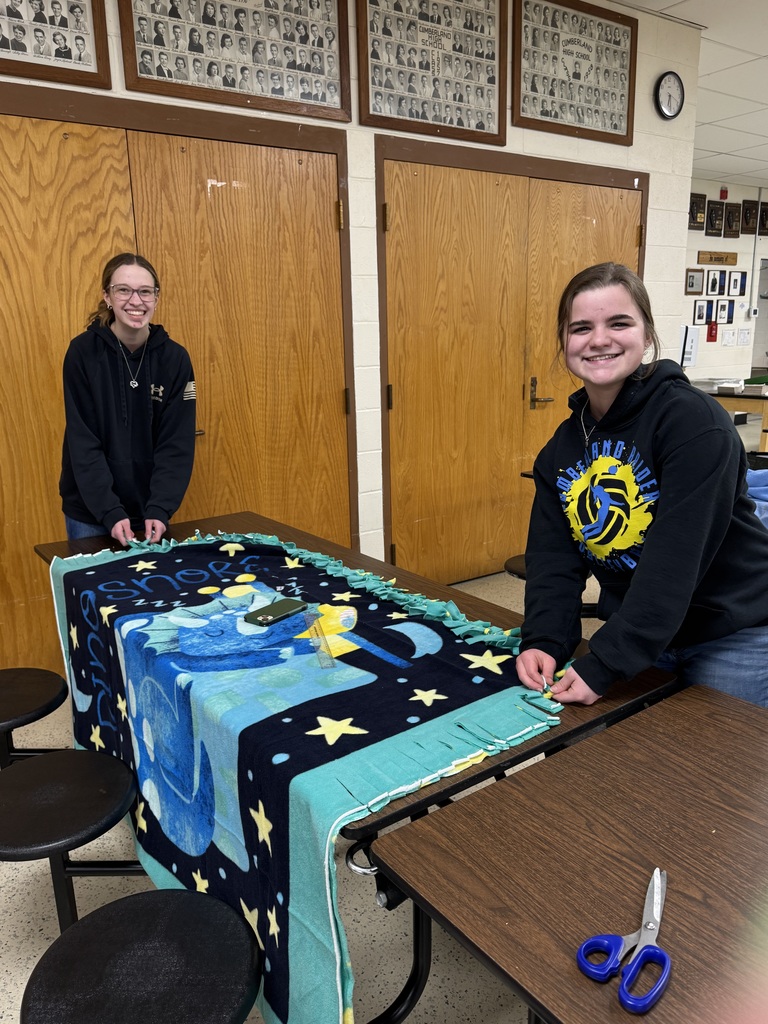 NHS students are tying the blankets.
