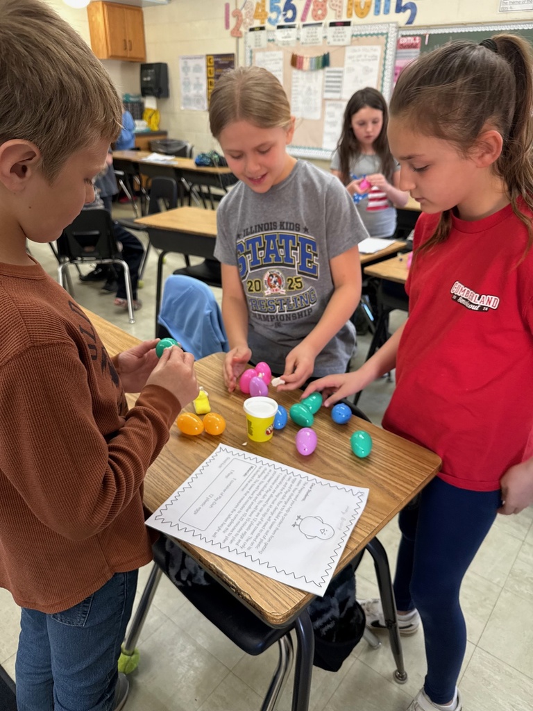 The students are using eggs and Playdoh to complete a STEM challenge.