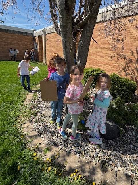 The students are marking off eggs on their charts.
