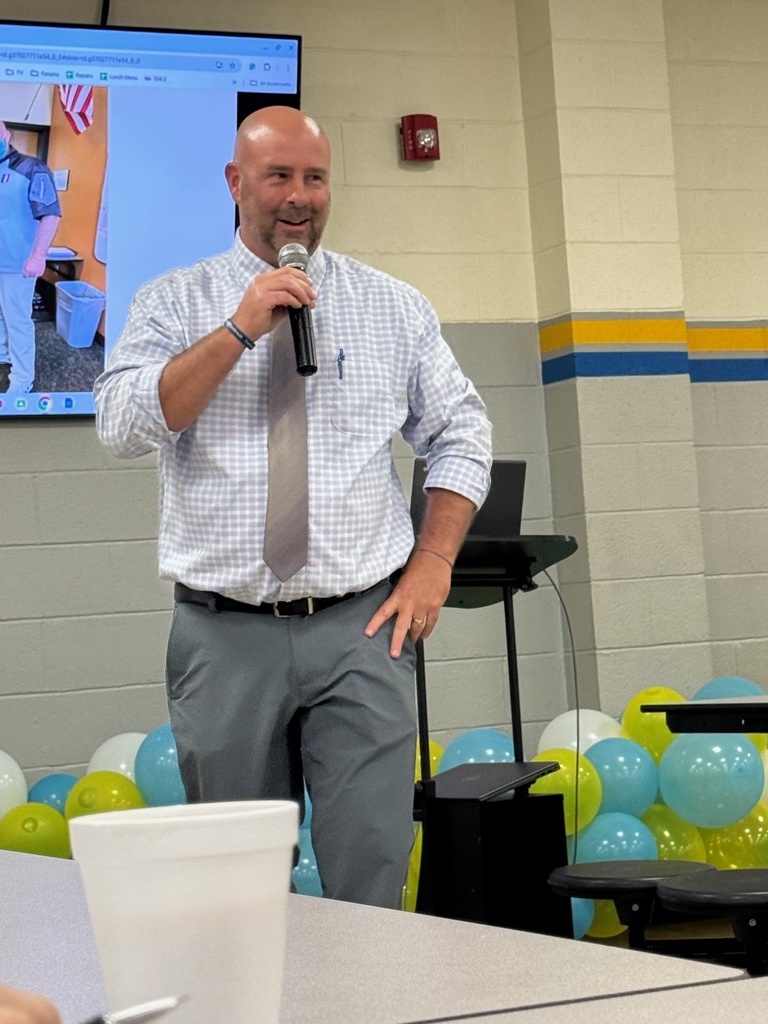 Mr. Houchin speaking to the staff.