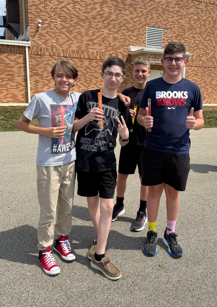 For boys are eating popsicles. 