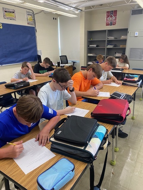 Students are figuring out the logic puzzle. 