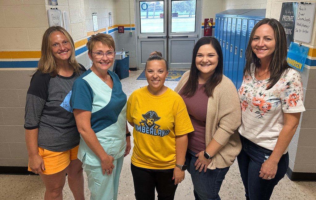 Pictured are the 5 alumni.