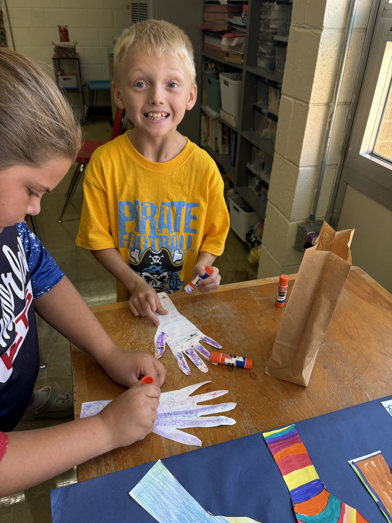Students are creating a collaborative art project.
