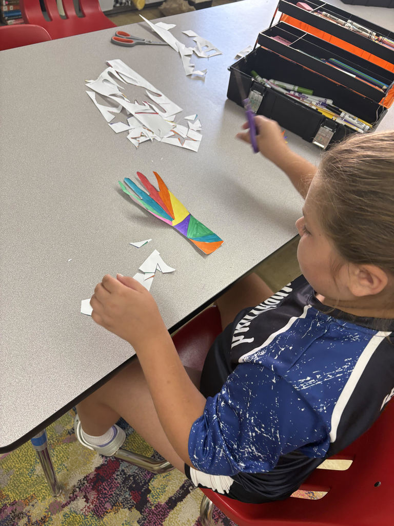 Students are creating a collaborative art project.