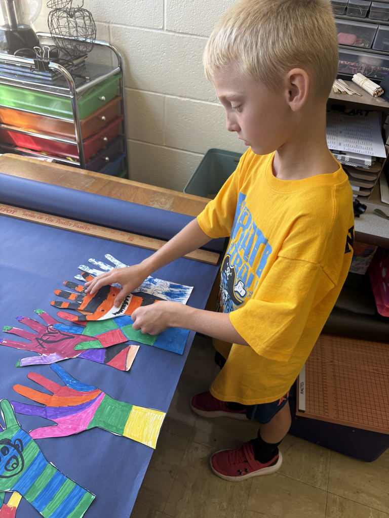 Students are creating a collaborative art project.