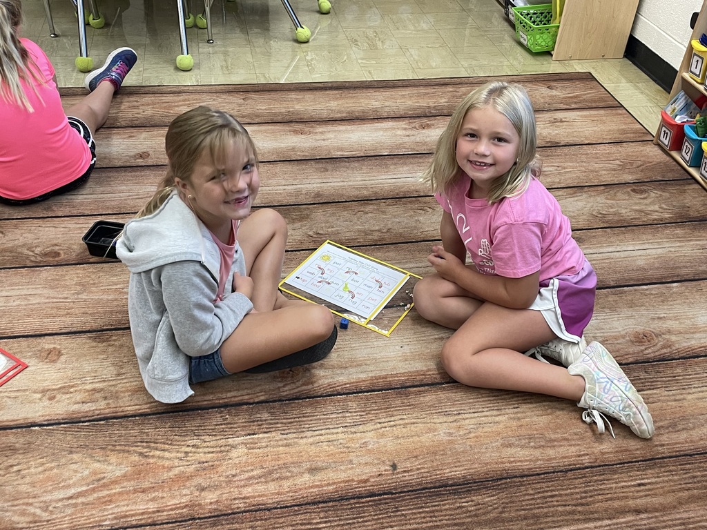 Two students are playing a game.