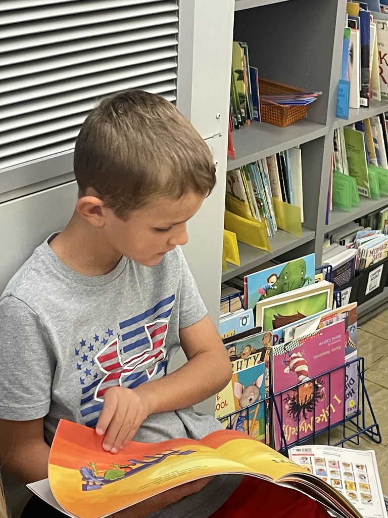 A student is reading a book. 