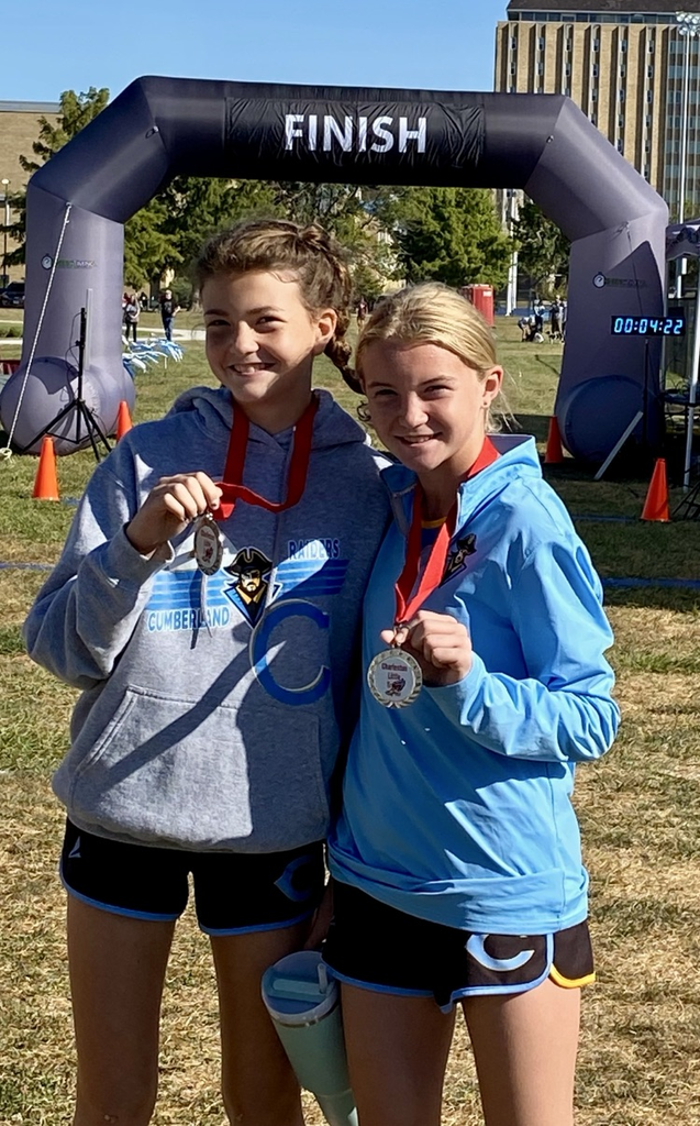 Pictured are the two medalists wearing their medals 