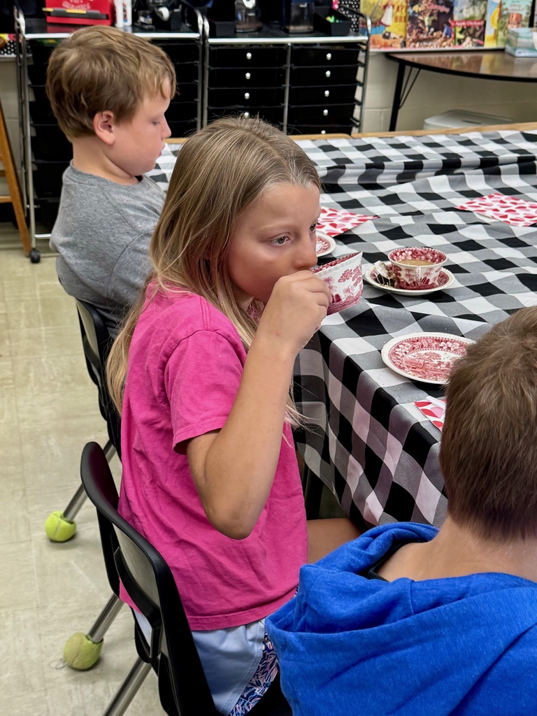 A student is drinking her tea.