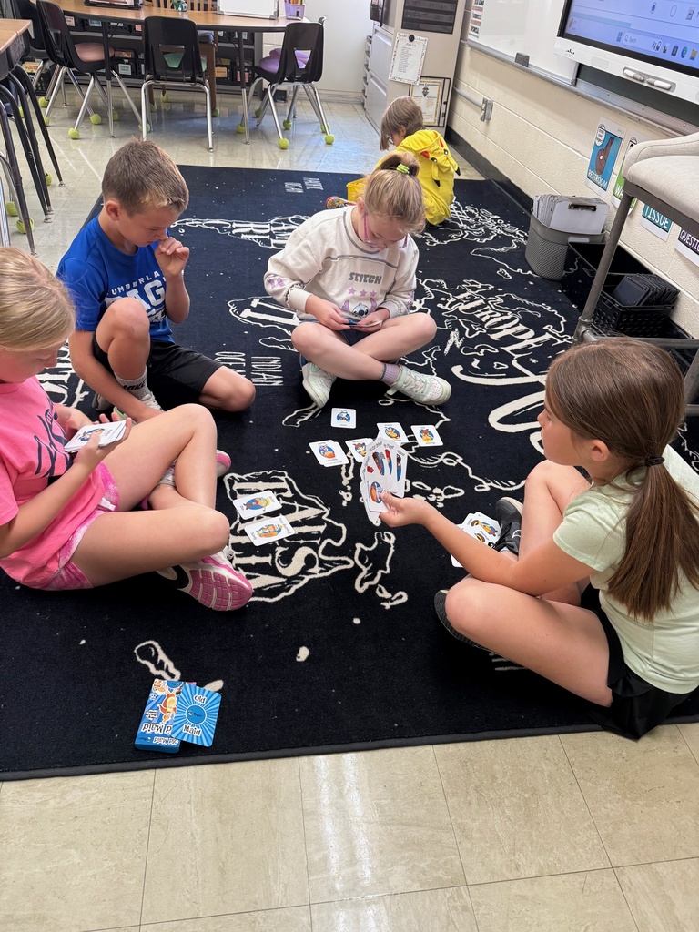 A group of students are playing a game. 